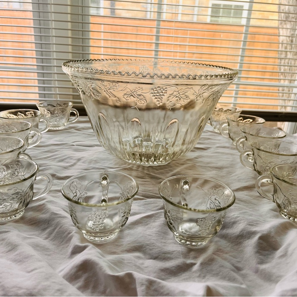 Antique Glass Crystal Punch Bowl with 12 matching cups.